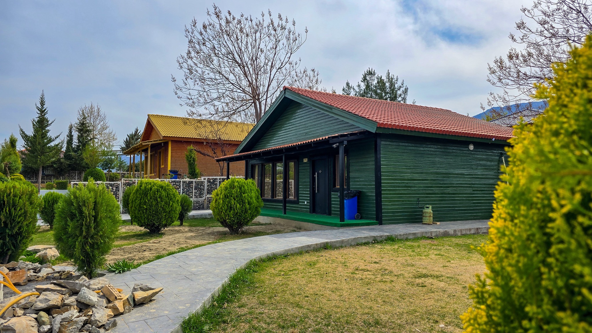 Colorful deluxe villas with landscaped grounds