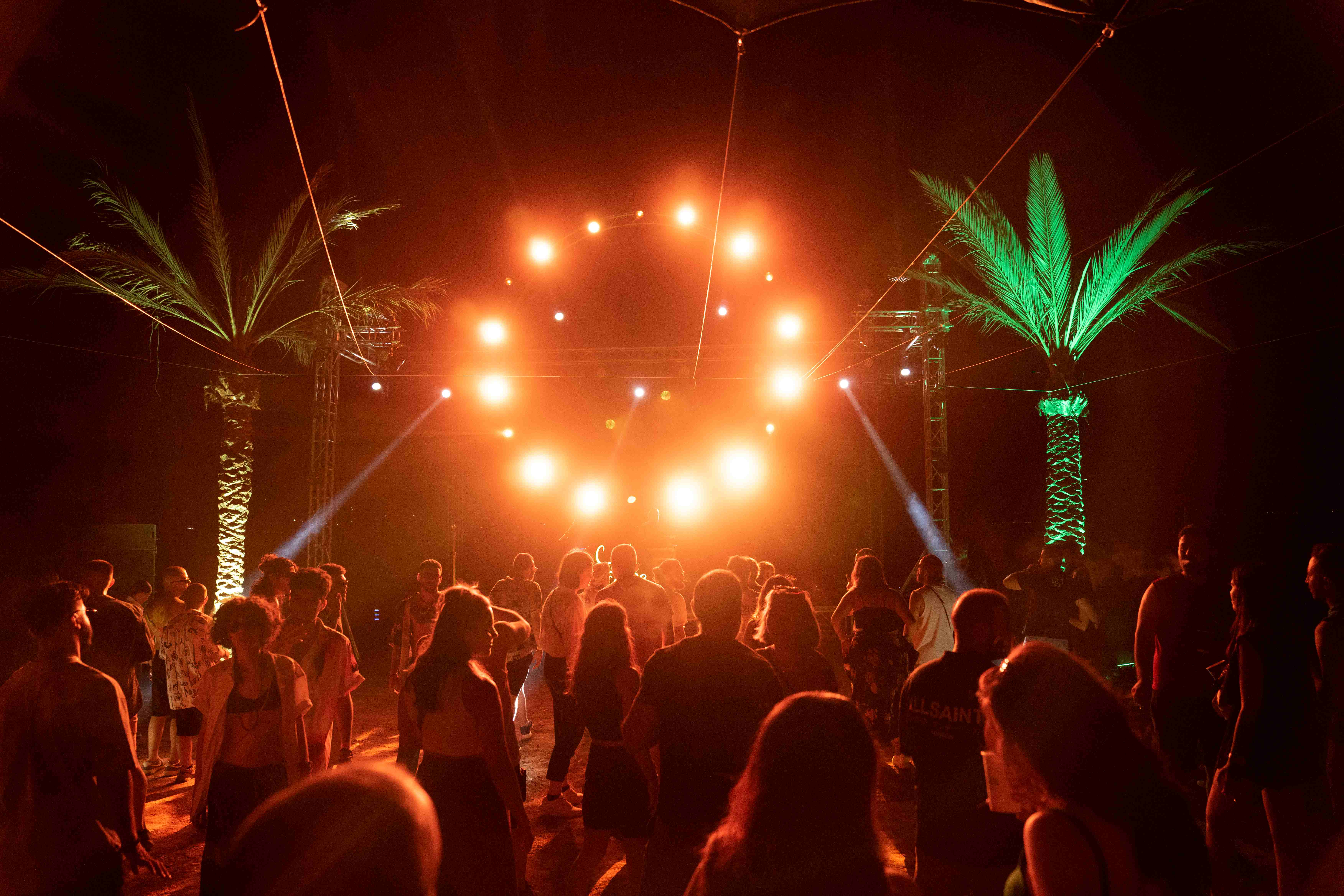 Soul Escape festival night scene with dramatic lighting and crowd